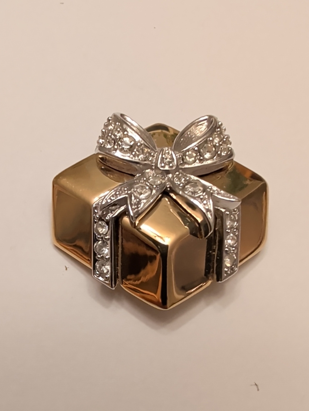 Joan Rivers Gold and Silver Present Brooch with Clear Crystals